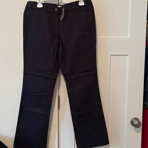 Never worn, navy boot, cut pants
